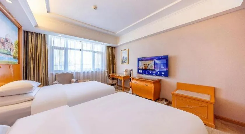 Bed in Vienna Hotel Qinghai Dachaidan