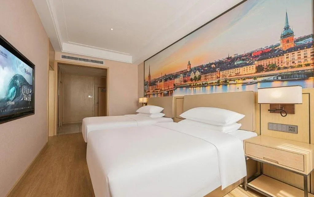 Bed in Vienna Hotel Qinghai Dachaidan