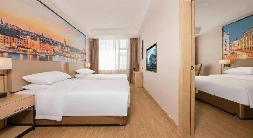 Bed in Vienna Hotel Qinghai Dachaidan