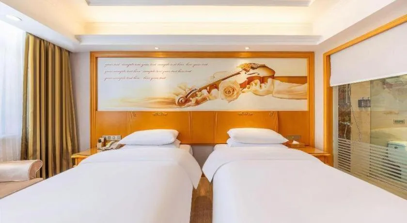 Bed in Vienna Hotel Qinghai Dachaidan