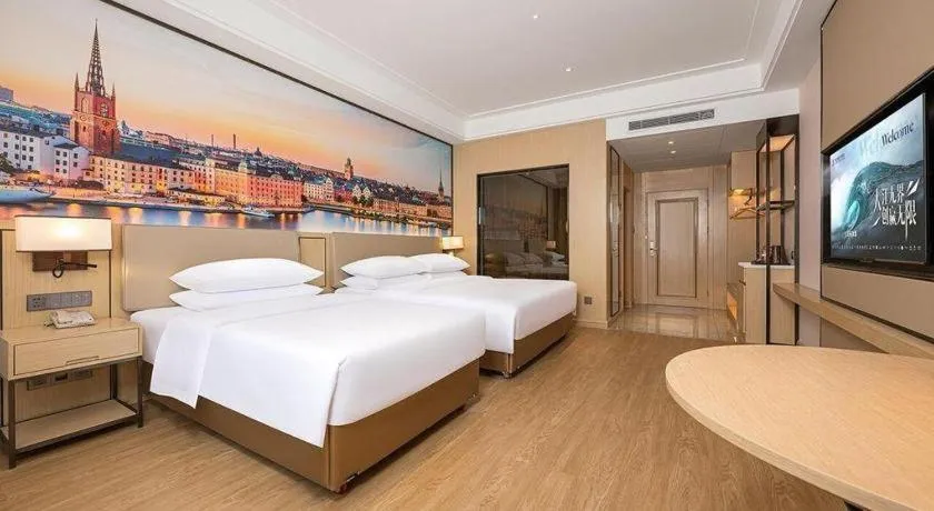 Bed in Vienna Hotel Qinghai Dachaidan