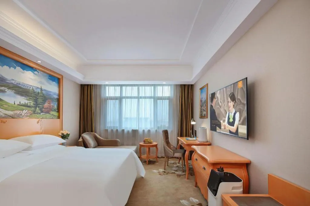 Bed in Vienna Hotel Qinghai Dachaidan