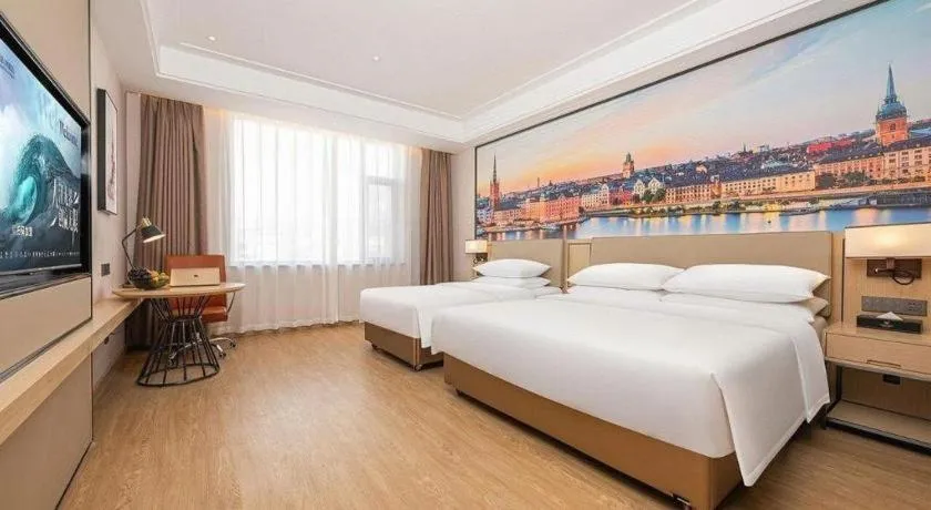 Bed in Vienna Hotel Qinghai Dachaidan