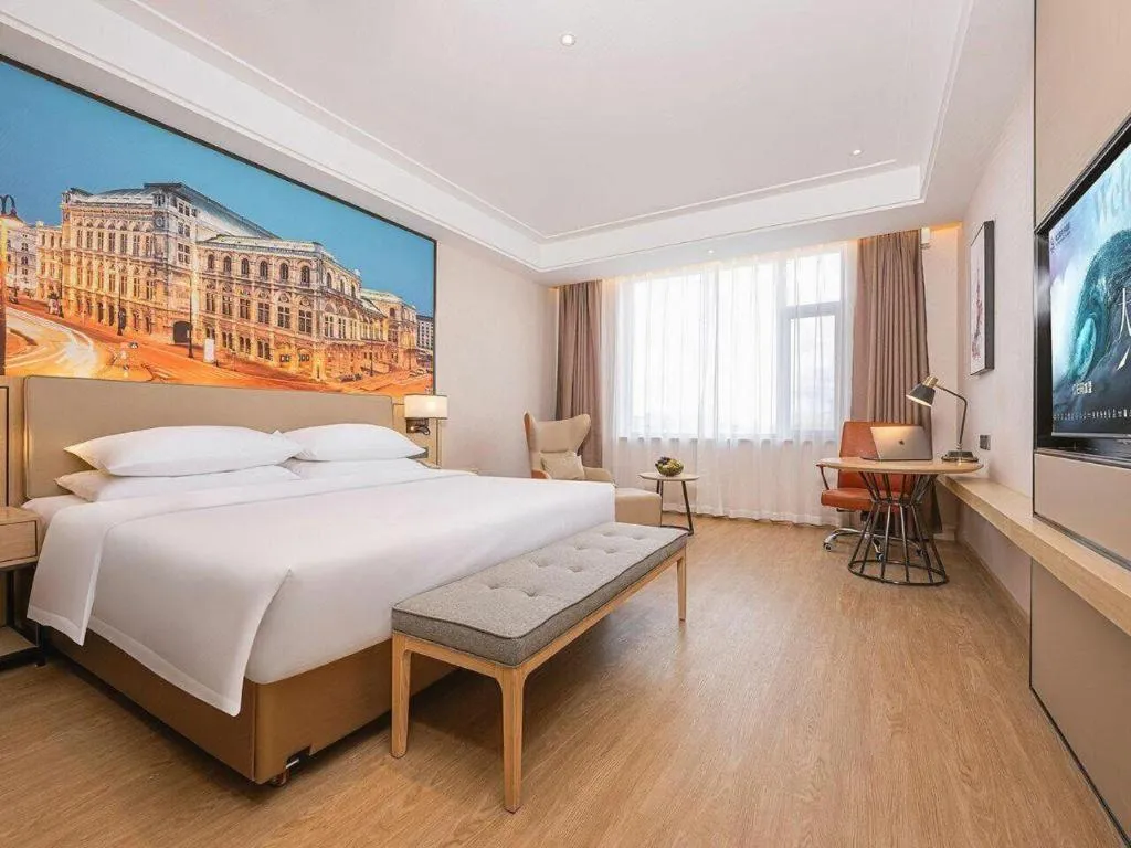 Bed in Vienna Hotel Qinghai Dachaidan