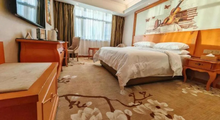 Bed in Vienna Hotel Qinghai Dachaidan