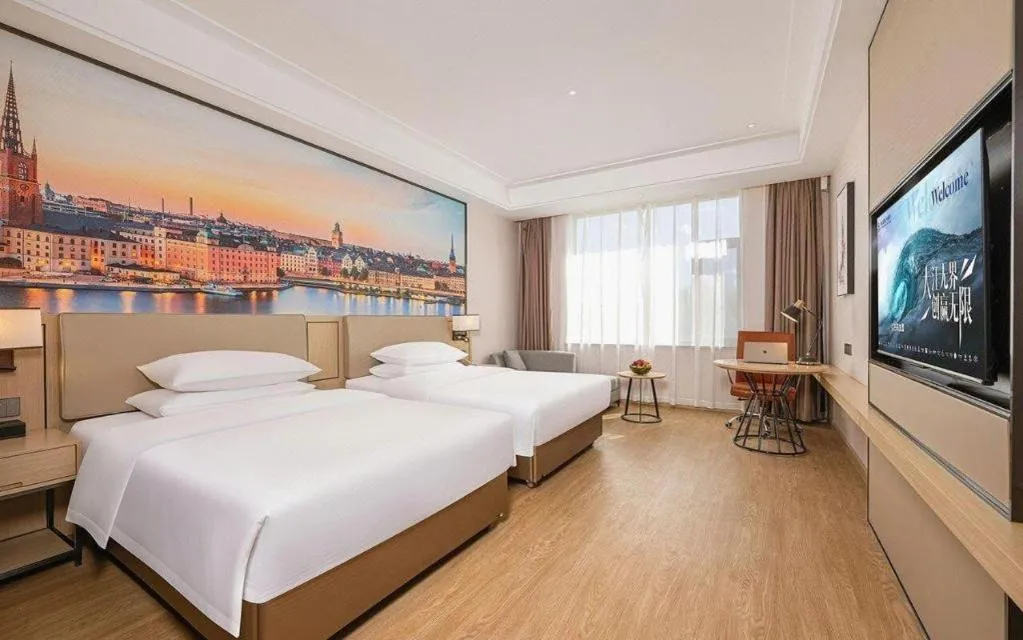 Bed in Vienna Hotel Qinghai Dachaidan