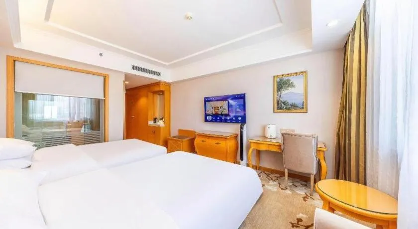 Bed in Vienna Hotel Qinghai Dachaidan