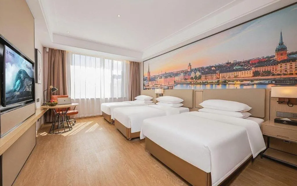 Bed in Vienna Hotel Qinghai Dachaidan