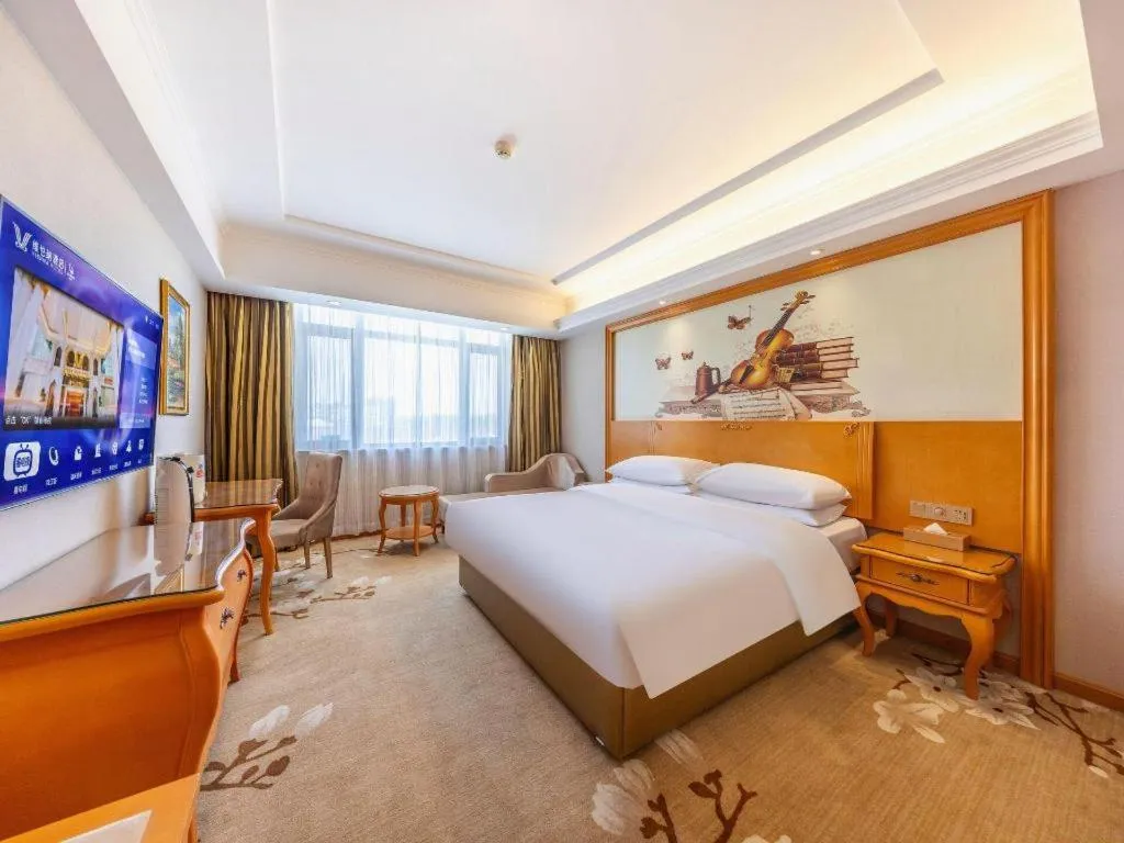 Bed in Vienna Hotel Qinghai Dachaidan