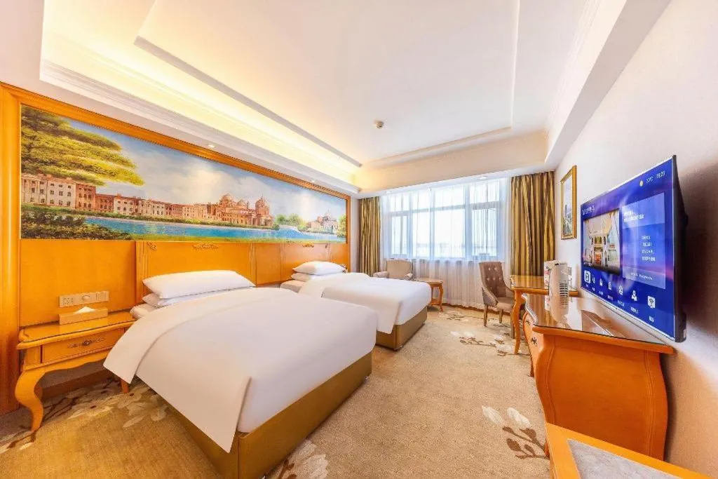 Bed in Vienna Hotel Qinghai Dachaidan