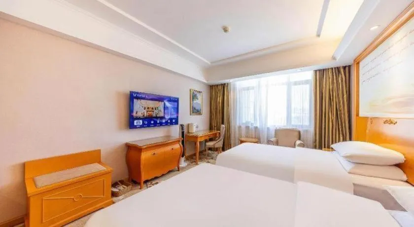 Bed in Vienna Hotel Qinghai Dachaidan