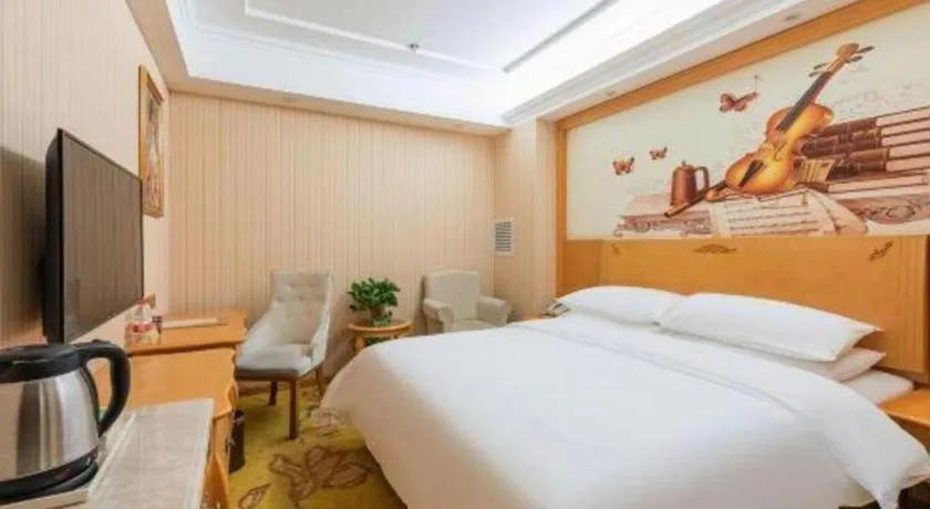 Bed in Vienna Hotel Hebei Cangzhou Mingzhu Market