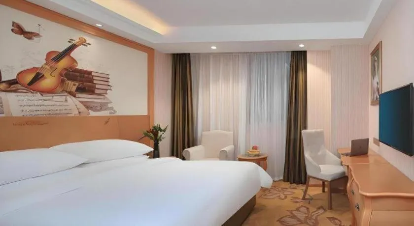 Bed in Vienna Hotel Hebei Cangzhou Mingzhu Market