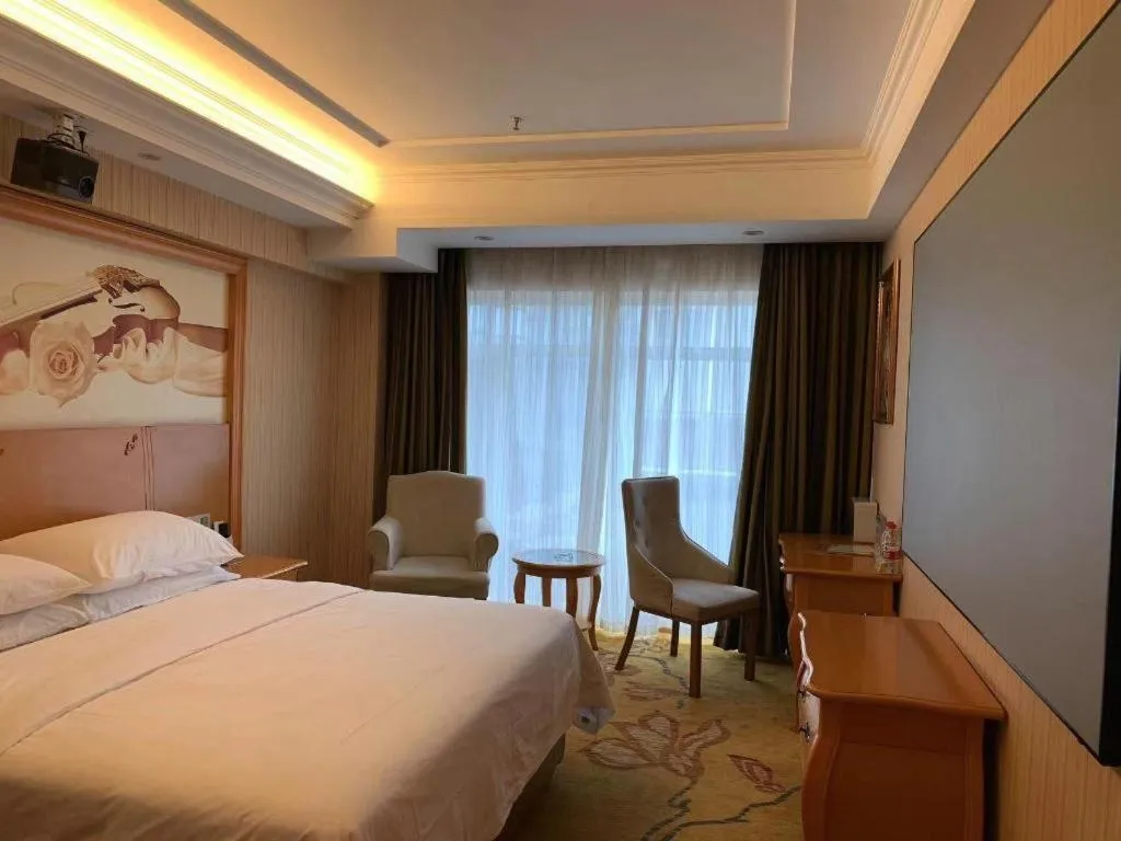 Bed in Vienna Hotel Hebei Cangzhou Mingzhu Market