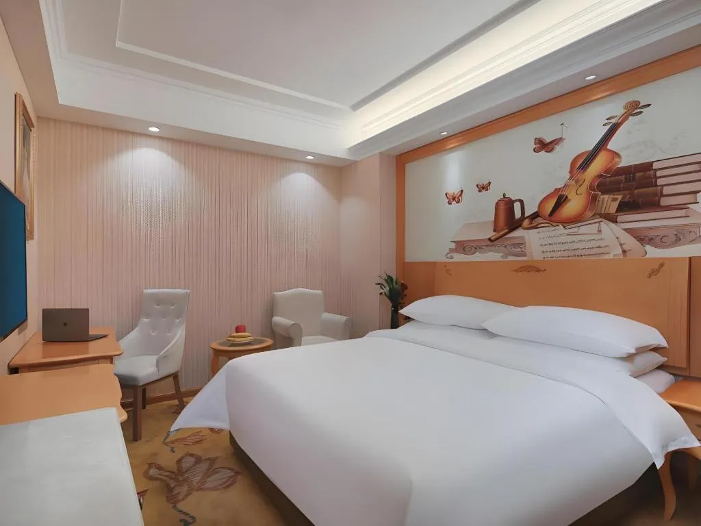 Bed in Vienna Hotel Hebei Cangzhou Mingzhu Market