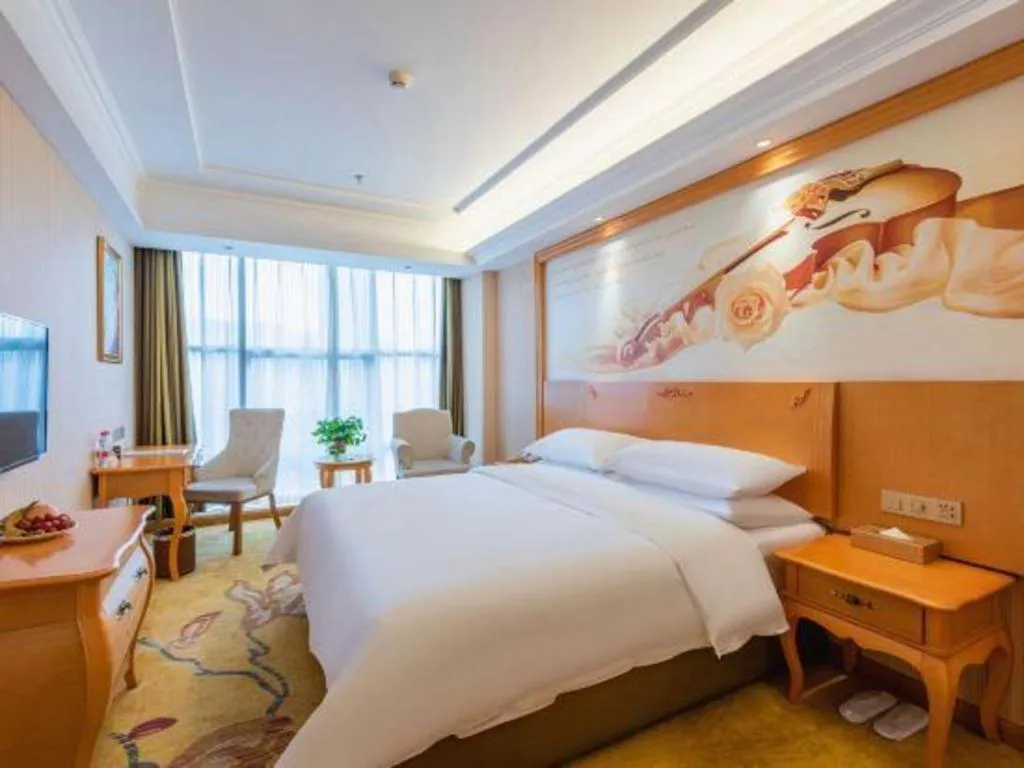 Bed in Vienna Hotel Hebei Cangzhou Mingzhu Market