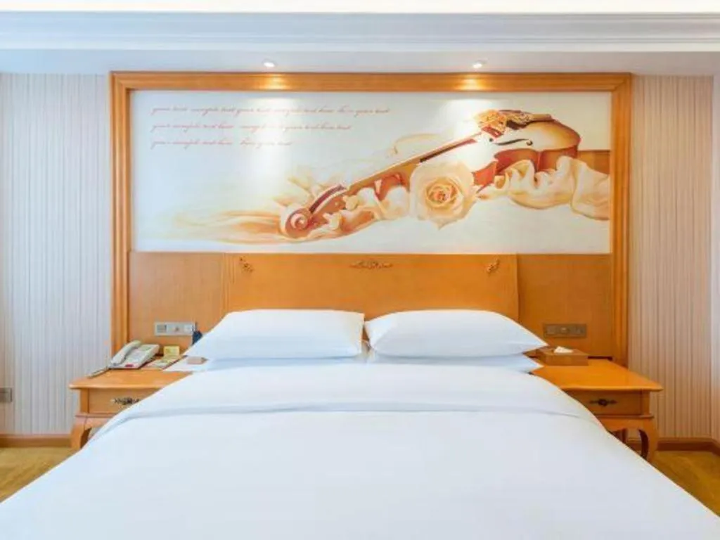 Bed in Vienna Hotel Hebei Cangzhou Mingzhu Market