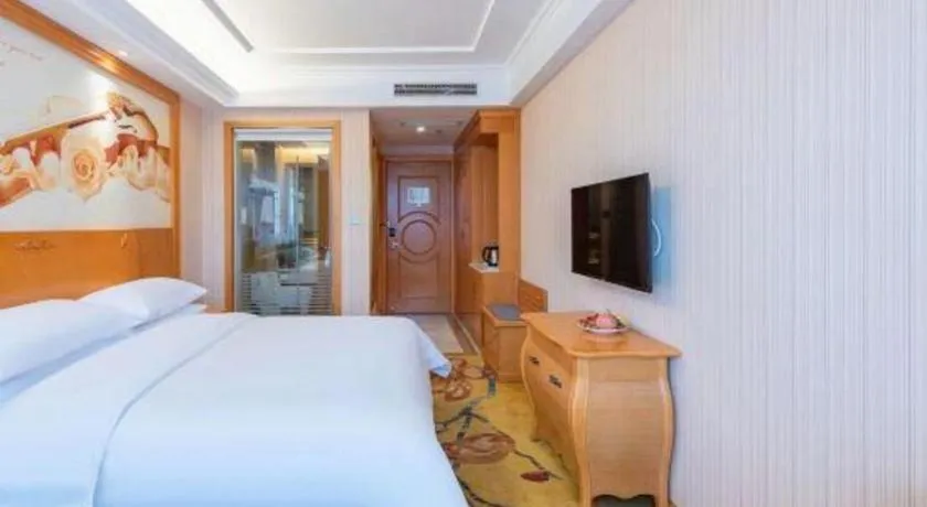 Bed in Vienna Hotel Hebei Cangzhou Mingzhu Market