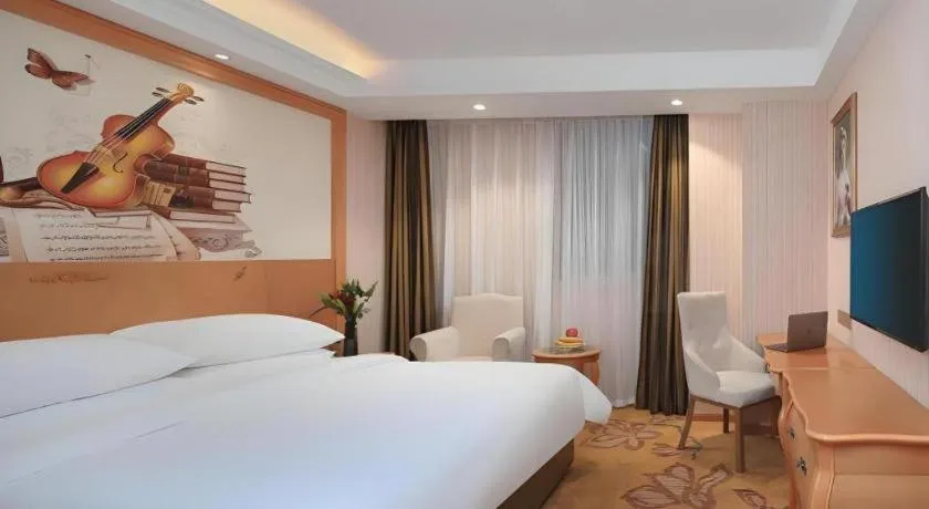 Bed in Vienna Hotel Hebei Cangzhou Mingzhu Market