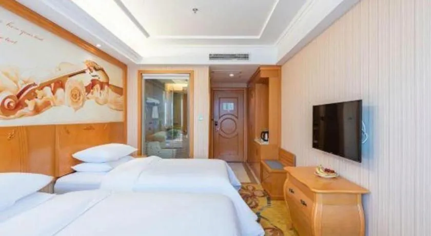 Bed in Vienna Hotel Hebei Cangzhou Mingzhu Market