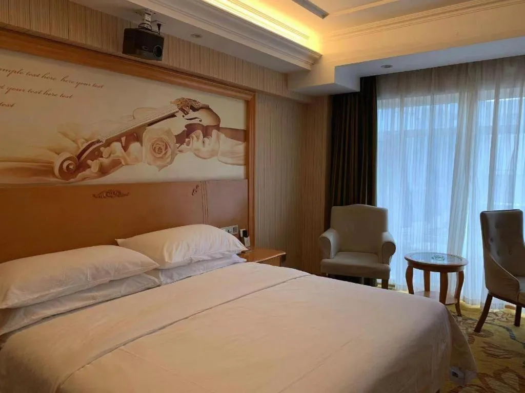 Bed in Vienna Hotel Hebei Cangzhou Mingzhu Market