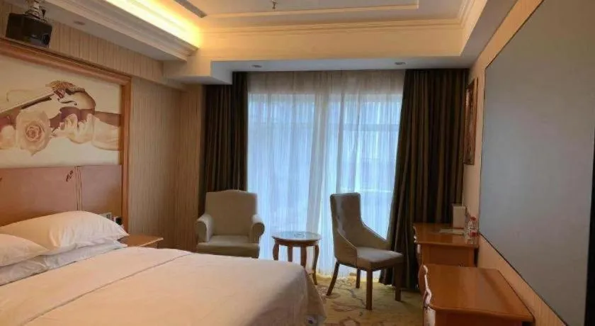 Bed in Vienna Hotel Hebei Cangzhou Mingzhu Market