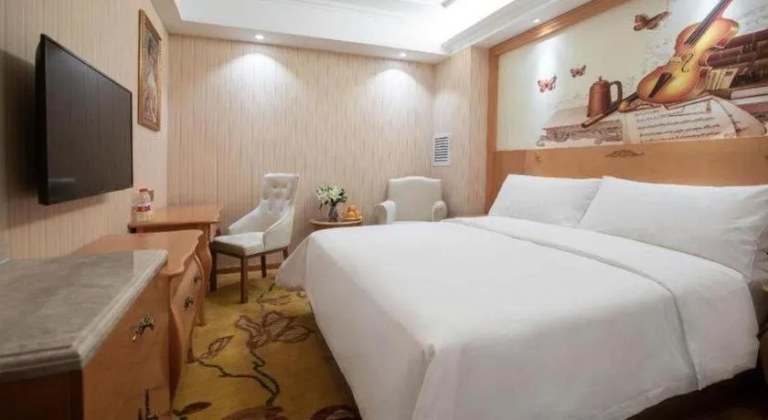 Bed in Vienna Hotel Hebei Cangzhou Mingzhu Market