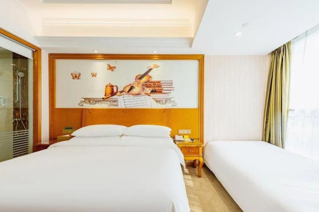 Bed in Vienna Hotel Hebei Hengshui High-Speed Railway Station