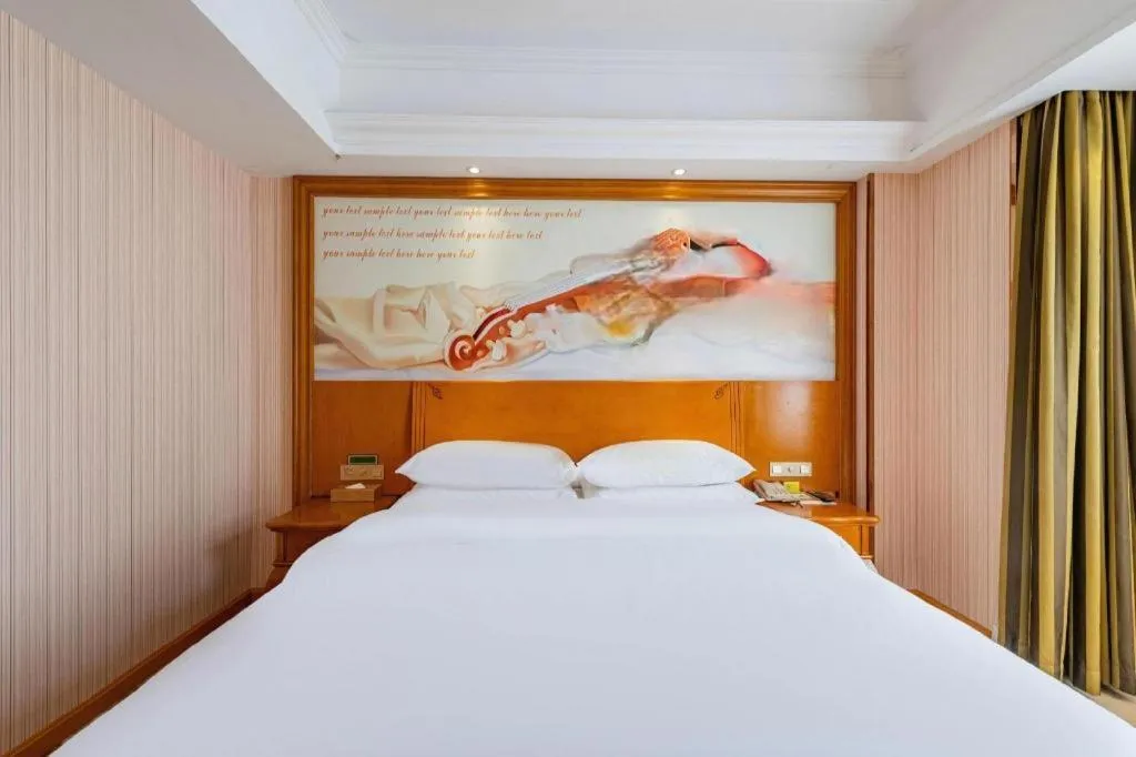Bed in Vienna Hotel Hebei Hengshui High-Speed Railway Station