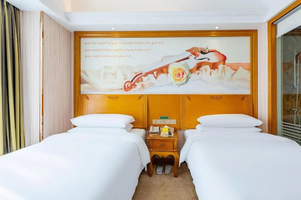 Bed in Vienna Hotel Hebei Hengshui High-Speed Railway Station