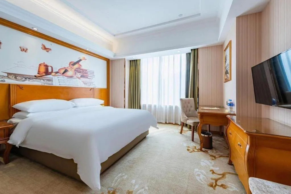 Bed in Vienna Hotel Hebei Hengshui High-Speed Railway Station