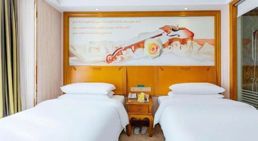 Bed in Vienna Hotel Hebei Hengshui High-Speed Railway Station