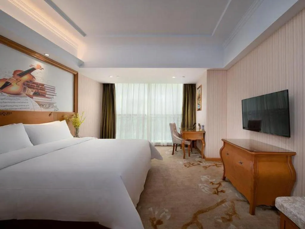Bed in Vienna Hotel Hebei Hengshui High-Speed Railway Station