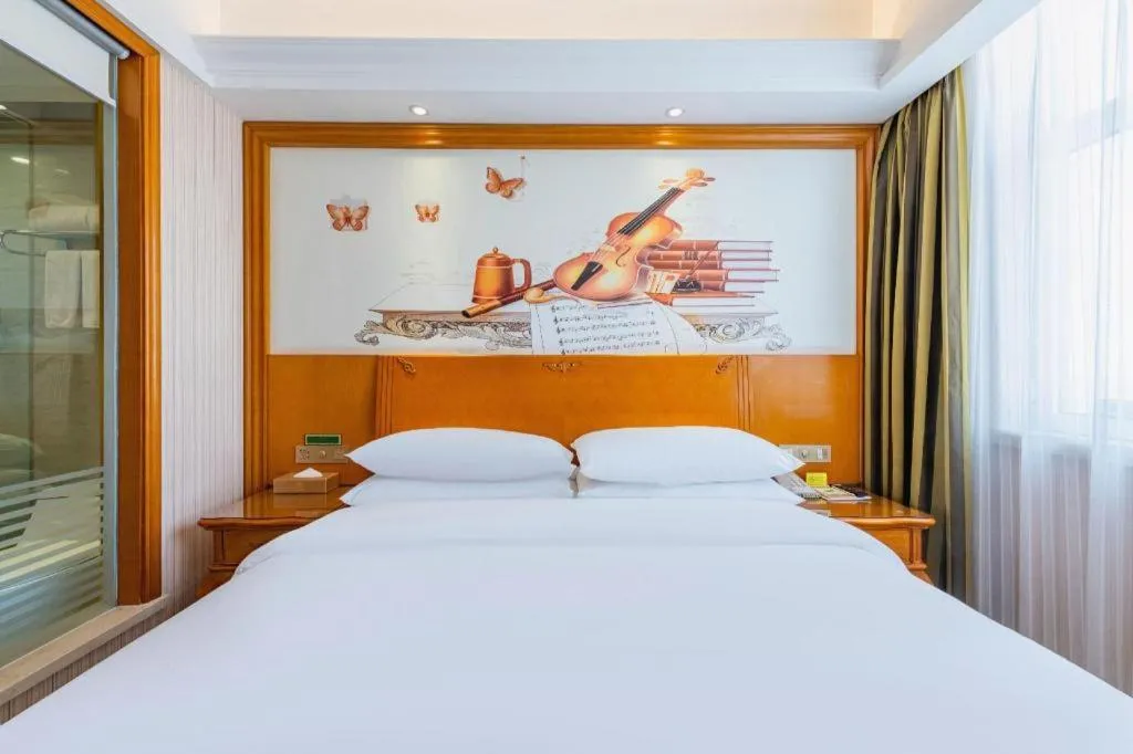 Bed in Vienna Hotel Hebei Hengshui High-Speed Railway Station