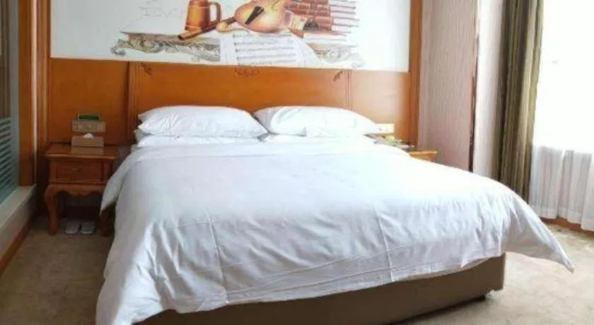 Bed in Vienna Hotel Hebei Hengshui High-Speed Railway Station