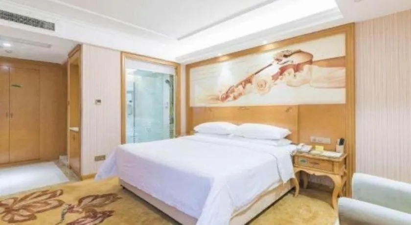 Bed in Vienna Hotel Hebei Hengshui High-Speed Railway Station
