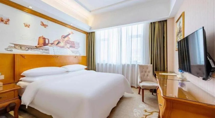 Bed in Vienna Hotel Hebei Hengshui High-Speed Railway Station