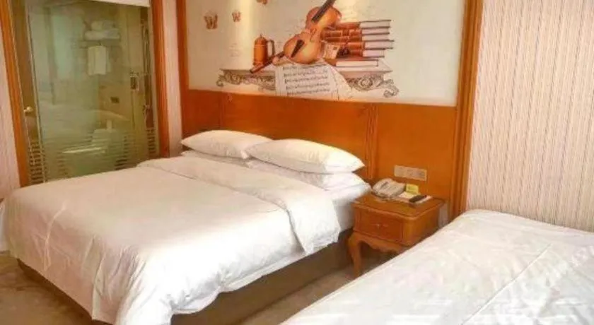 Bed in Vienna Hotel Hebei Hengshui High-Speed Railway Station
