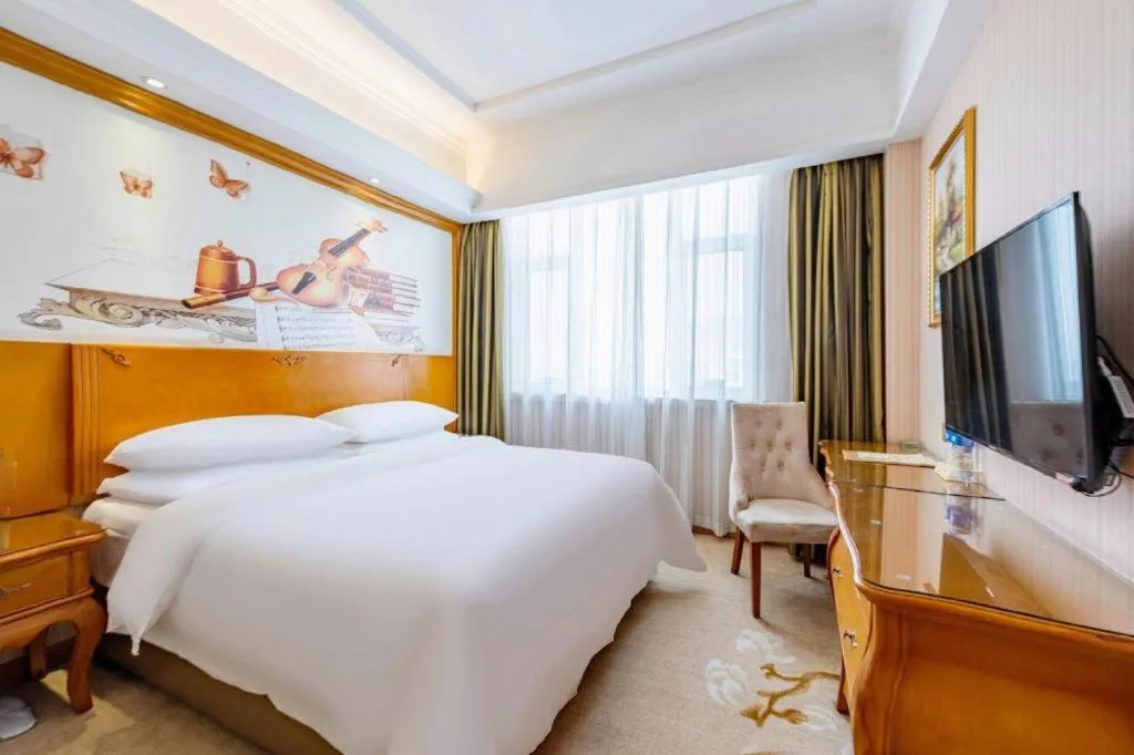 Bed in Vienna Hotel Hebei Hengshui High-Speed Railway Station
