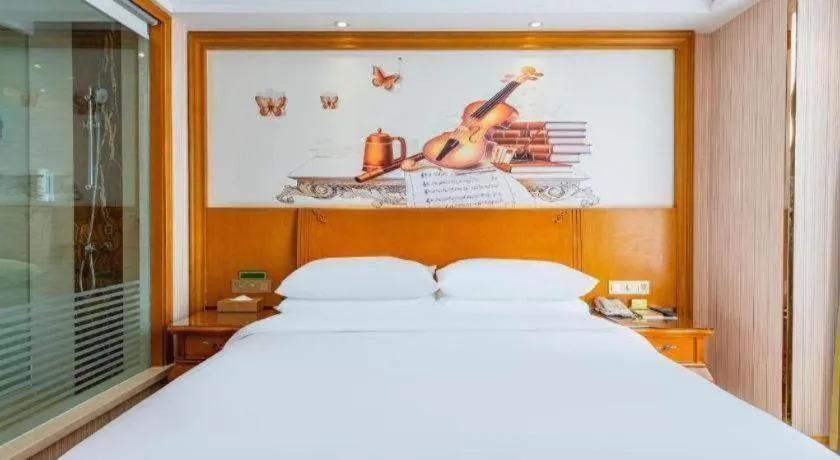 Bed in Vienna Hotel Hebei Hengshui High-Speed Railway Station