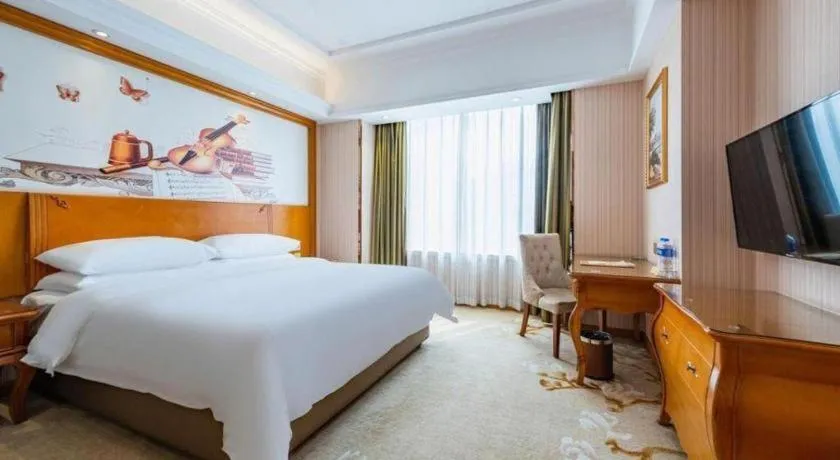 Bed in Vienna Hotel Hebei Hengshui High-Speed Railway Station