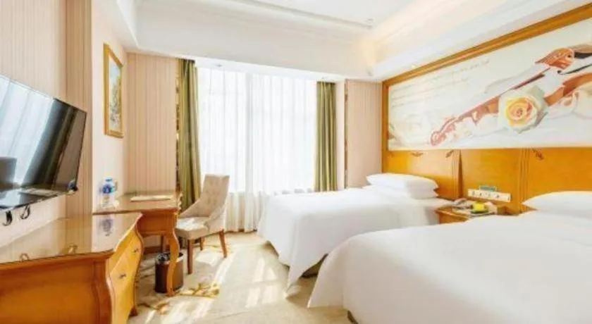 Bed in Vienna Hotel Hebei Hengshui High-Speed Railway Station