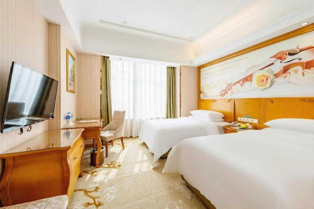 Bed in Vienna Hotel Hebei Hengshui High-Speed Railway Station