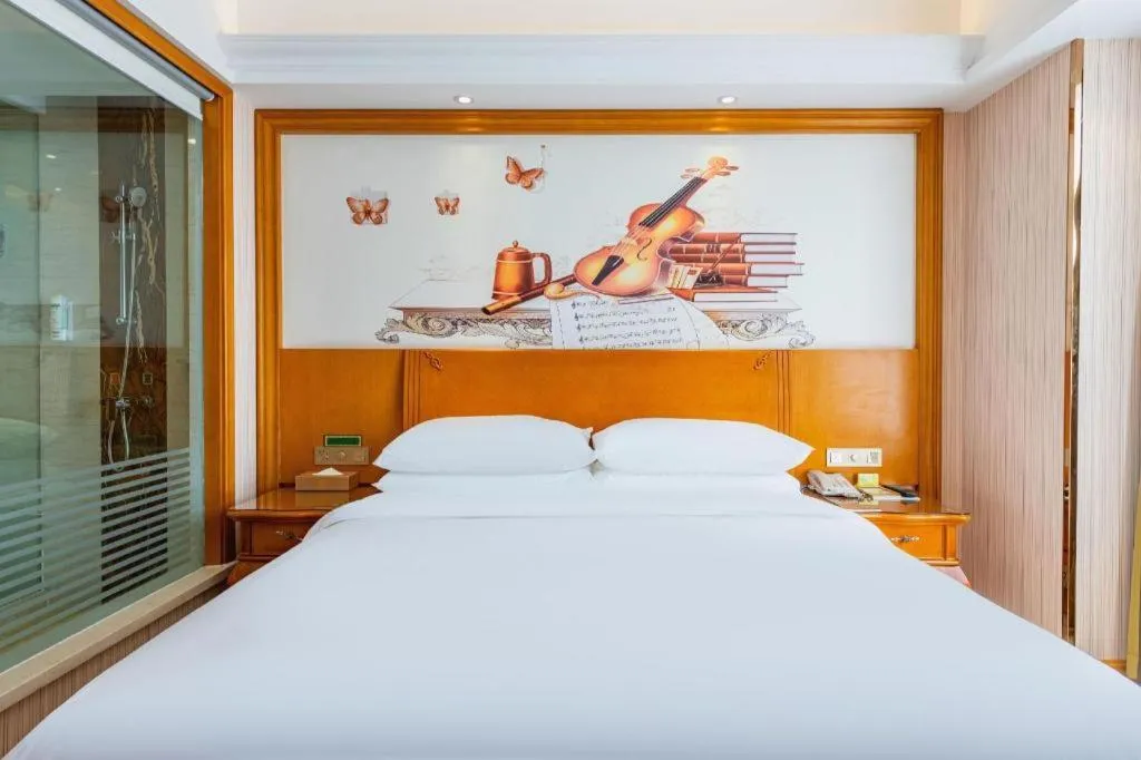 Bed in Vienna Hotel Hebei Hengshui High-Speed Railway Station