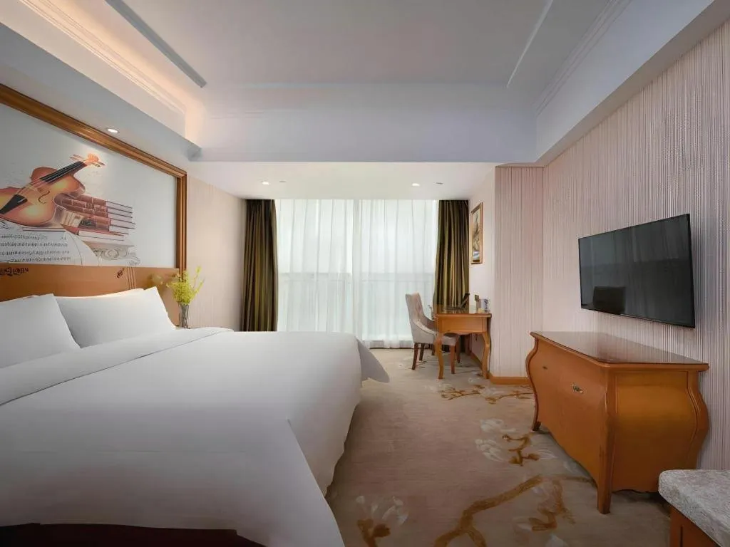 Bed in Vienna Hotel Hebei Hengshui High-Speed Railway Station