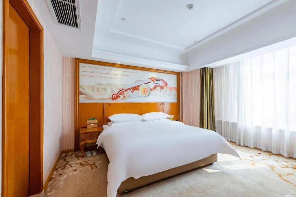 Bed in Vienna Hotel Hebei Hengshui High-Speed Railway Station