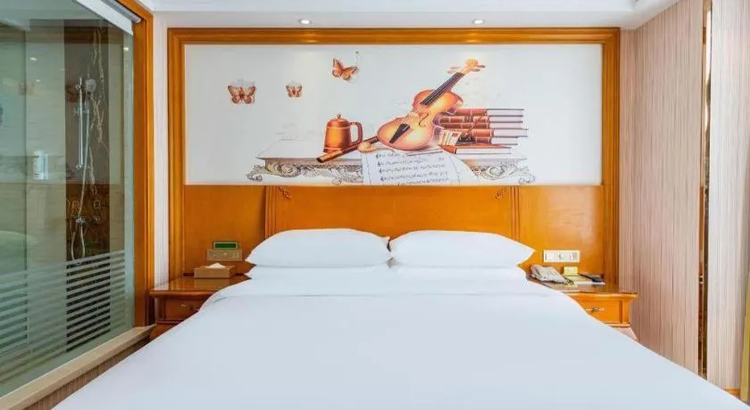 Bed in Vienna Hotel Hebei Hengshui High-Speed Railway Station