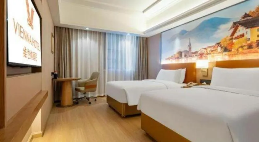 Bed in Vienna Hotel Hunan Jishou Fenghuang Ancient City