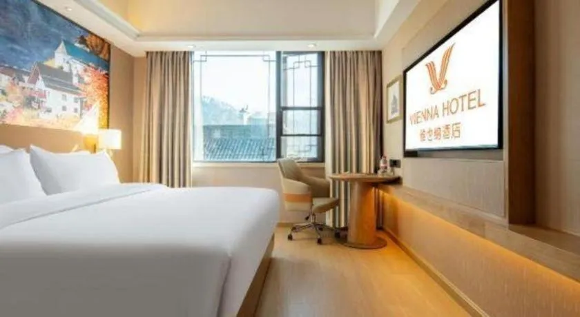 Bed in Vienna Hotel Hunan Jishou Fenghuang Ancient City