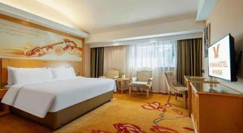 Bed in Vienna Hotel Hunan Jishou Fenghuang Ancient City